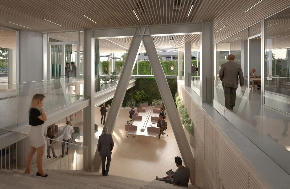 Moderne kantoorruimte aan de Marten Meesweg met glazen wanden, open werkplekken en een groene binnentuin.